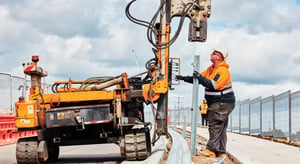 Road workers completing safety inspection 